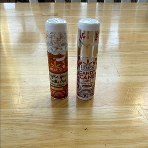 Hempz Pumpkin Spice & Candy Cane Lip Balm Duo - Orange, White, Red